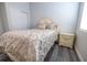 Bedroom with antique-style bed and nightstand at 2335 W Beach St, Tampa, FL 33607