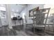 Kitchen dining area with a round glass table and four chairs at 2335 W Beach St, Tampa, FL 33607