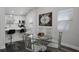 Bright dining area featuring modern lighting, a glass table, and stylish decor at 2335 W Beach St, Tampa, FL 33607