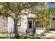 Charming stucco home with a cozy front porch and well-maintained landscaping at 2335 W Beach St, Tampa, FL 33607
