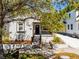 Charming stucco home with a cozy front porch and well-maintained landscaping at 2335 W Beach St, Tampa, FL 33607