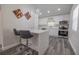 Open concept kitchen with island seating and stainless steel appliances at 2335 W Beach St, Tampa, FL 33607