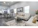 Open concept living room and kitchen with white couches and dining table at 2335 W Beach St, Tampa, FL 33607
