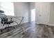 Bright office space with a glass desk and view into the bathroom at 2335 W Beach St, Tampa, FL 33607
