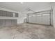 Attached garage with extra storage cabinets at 2892 North Rd, Clearwater, FL 33760