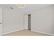 Bedroom with wood floors and a closet with sliding doors at 2892 North Rd, Clearwater, FL 33760