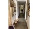 Long hallway with artwork and polished concrete floors at 3301 W Corona St, Tampa, FL 33629