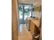 Laundry room with washer, dryer, and built-in cabinets at 3301 W Corona St, Tampa, FL 33629