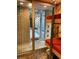 Bedroom with a view of the courtyard through sliding glass doors at 3301 W Corona St, Tampa, FL 33629