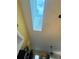 Bright skylight illuminating a hallway, adding natural light to the home at 3300 Loveland Blvd # 502, Punta Gorda, FL 33980