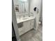 Bright bathroom with white vanity and quartz countertop at 3300 Loveland Blvd # 502, Punta Gorda, FL 33980