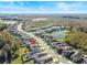 Aerial view of the house and surrounding community at 10662 Hawks Landing Dr, Land O Lakes, FL 34638