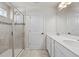 Bathroom with double vanity, large shower, and plenty of counter space at 10662 Hawks Landing Dr, Land O Lakes, FL 34638