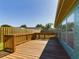 Wooden deck overlooks grassy backyard at 3900 Berwick Dr, New Port Richey, FL 34652