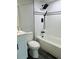 Updated bathroom with a bathtub and walk-in shower at 7108 Waterside Dr # 103, Tampa, FL 33617
