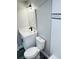 Modern bathroom with white vanity, black fixtures, and patterned tile at 7108 Waterside Dr # 103, Tampa, FL 33617