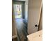 Bedroom with sliding doors to a patio and water view at 7108 Waterside Dr # 103, Tampa, FL 33617