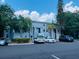 Two-story residential building with ample parking in front, surrounded by landscaping at 7108 Waterside Dr # 103, Tampa, FL 33617