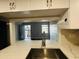 Kitchen with a pass-through to the living area at 7108 Waterside Dr # 103, Tampa, FL 33617