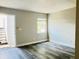 Living room with grey vinyl flooring and neutral walls at 7108 Waterside Dr # 103, Tampa, FL 33617