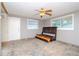 Spacious bedroom with hardwood floors and ceiling fan at 4116 Haines N Rd, St Petersburg, FL 33703