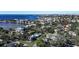 Aerial view of a house located in a residential neighborhood near the water at 4911 W Juno St, Tampa, FL 33629