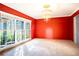 Dining Room with large window and chandelier at 4911 W Juno St, Tampa, FL 33629