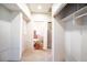 Clean hallway with access to bathroom and large closet at 4911 W Juno St, Tampa, FL 33629