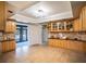 Spacious kitchen with wood cabinets, tile floors and breakfast nook at 4911 W Juno St, Tampa, FL 33629