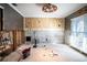 Living room undergoing renovation, walls and floors open at 4911 W Juno St, Tampa, FL 33629