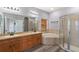 Double vanity bathroom with soaking tub and walk-in shower at 1820 Mira Lago Cir, Ruskin, FL 33570