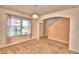 Dining room with carpeted floor and view of entry at 3505 San Moise Pl, Plant City, FL 33567