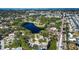 House nestled near a lake with surrounding neighborhood at 6626 1St N St, St Petersburg, FL 33702