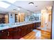 Large bathroom with double vanity and walk-in shower at 6626 1St N St, St Petersburg, FL 33702