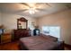 Bedroom with a queen-size bed and wood flooring at 6626 1St N St, St Petersburg, FL 33702