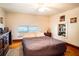 Bedroom with a queen-size bed and built-in shelves at 6626 1St N St, St Petersburg, FL 33702