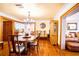 Spacious dining room, hardwood floors, large table, and built-in hutch at 6626 1St N St, St Petersburg, FL 33702