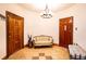 Elegant entryway with tiled floor, chandelier, and seating at 6626 1St N St, St Petersburg, FL 33702