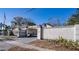 House exterior featuring unique architectural details and a spacious front yard at 6626 1St N St, St Petersburg, FL 33702