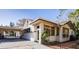 Side view of a house with a carport and walkway at 6626 1St N St, St Petersburg, FL 33702