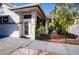 Side view of a house with a walkway and garden at 6626 1St N St, St Petersburg, FL 33702