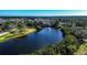 Peaceful lakefront property with lush greenery at 6626 1St N St, St Petersburg, FL 33702