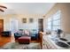 Cozy living room featuring a comfortable sofa and hardwood floors at 6626 1St N St, St Petersburg, FL 33702