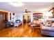 Open living room with hardwood floors, and comfortable seating at 6626 1St N St, St Petersburg, FL 33702