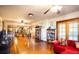 Spacious living room with hardwood floors and built-in shelving at 6626 1St N St, St Petersburg, FL 33702