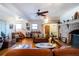 Spacious living room with hardwood floors, fireplace and leather sofas at 6626 1St N St, St Petersburg, FL 33702