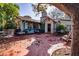 Large patio with multiple seating areas and a grill at 6626 1St N St, St Petersburg, FL 33702