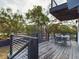 The back porch includes dining set with views of the backyard at 1793 N Fort Harrison Ave, Clearwater, FL 33755