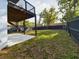 Spacious fenced backyard with concrete patio area perfect for outdoor entertaining and relaxation at 1793 N Fort Harrison Ave, Clearwater, FL 33755