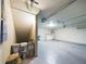 Spacious unfinished basement with concrete floor, laundry area, and under-stair storage at 1793 N Fort Harrison Ave, Clearwater, FL 33755